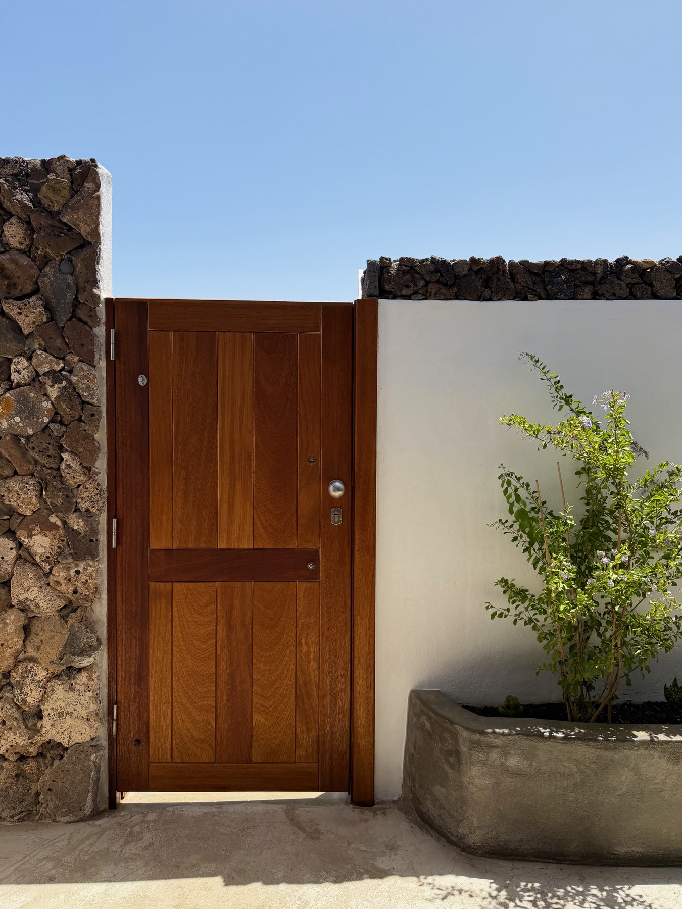 The timber gate in the lava wall, the way in to El Sol